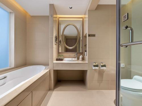 Habitación Doble Deluxe - 2 camas del hotel Pullman Zhangjiajie. Foto 1