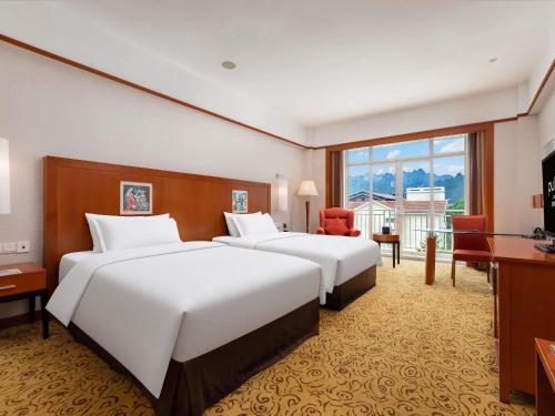 Habitación Doble Deluxe - 2 camas del hotel Pullman Zhangjiajie. Foto 4