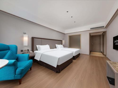 Habitación Doble Premium Deluxe - 2 camas del hotel Pullman Zhangjiajie. Foto 2
