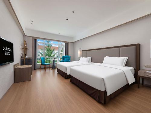 Habitación Doble Premium Deluxe - 2 camas del hotel Pullman Zhangjiajie. Foto 3