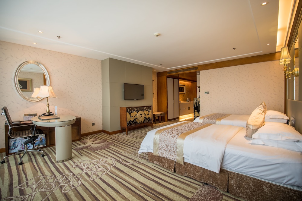 Habitación superior con 2 camas individuales del hotel Sunshine Zhangjiajie. Foto 2