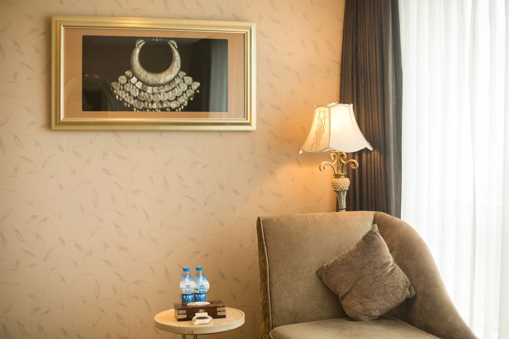 Habitación superior con 2 camas individuales del hotel Sunshine Zhangjiajie. Foto 3