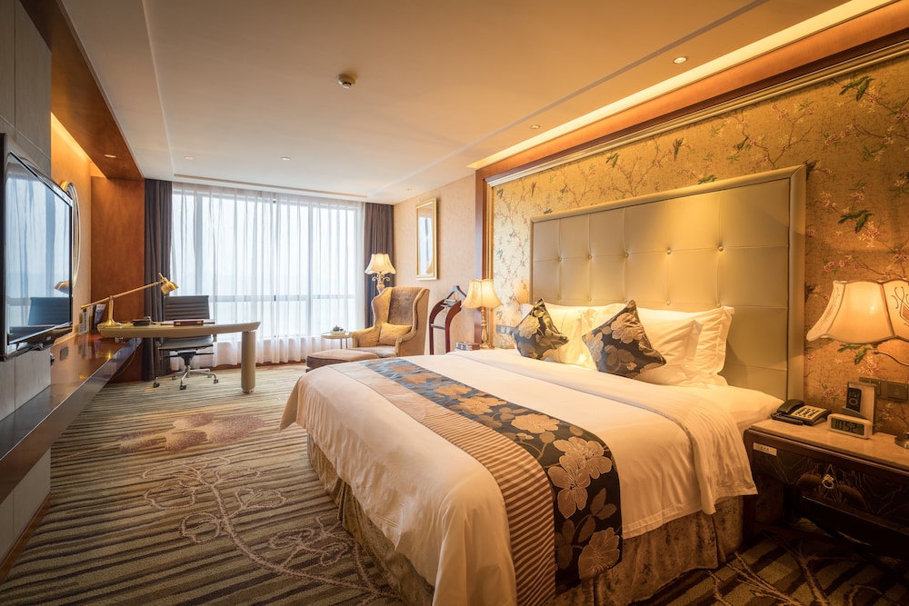 Habitación doble característica del hotel Sunshine Zhangjiajie. Foto 1