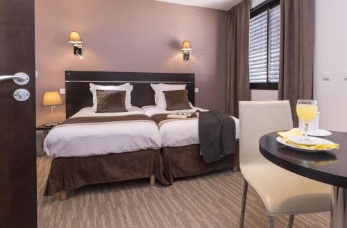 Suite Junior del hotel Zenitude Swiss Apparthotels. Foto 3