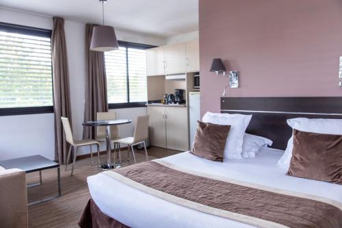 Suite Junior del hotel Zenitude Swiss Apparthotels. Foto 5