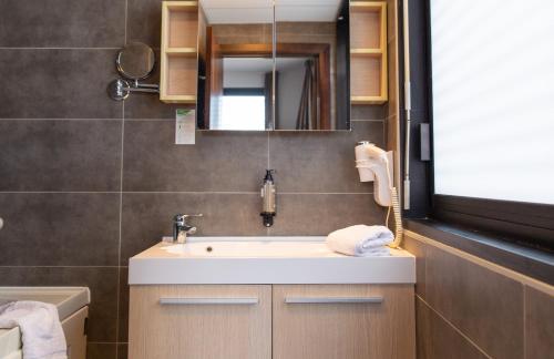 Estudio Doble con 2 camas individuales del hotel Zenitude Swiss Apparthotels. Foto 5