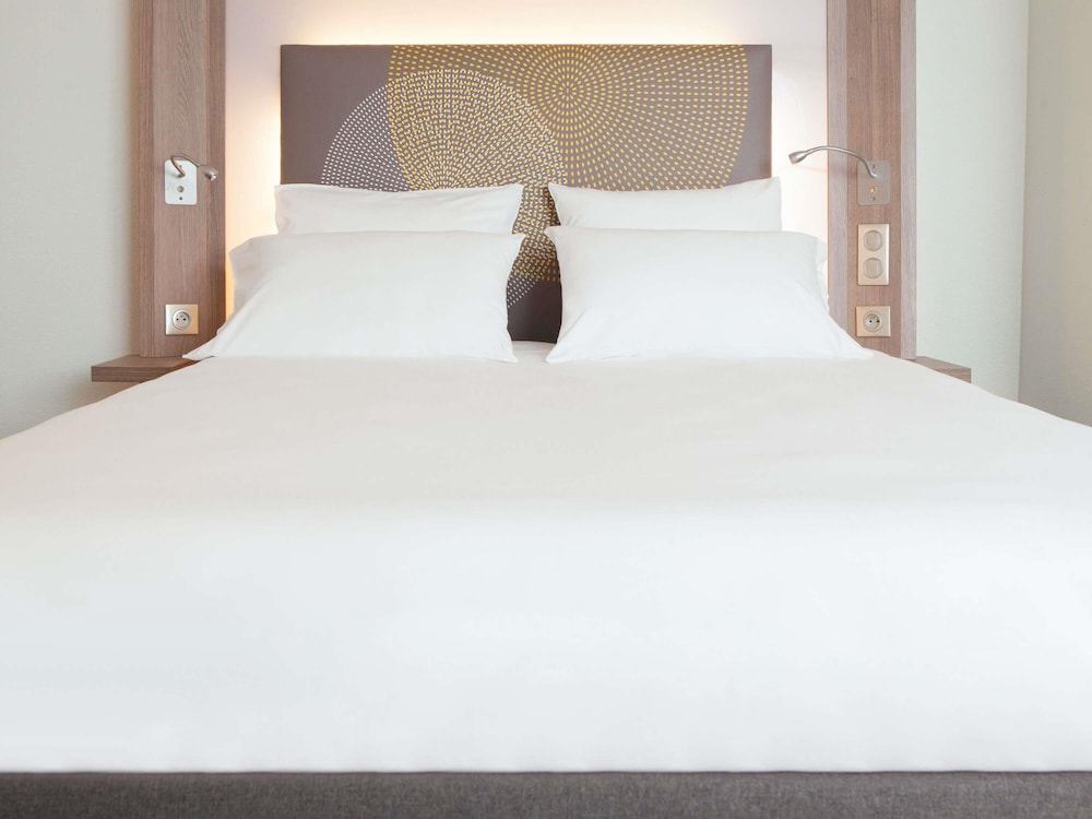 Habitación de categoría superior del hotel Novotel Lodz Centrum. Foto 11