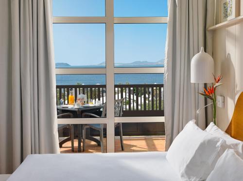 Habitación Doble con vistas al mar - 1 o 2 camas del hotel H10 Rubicón Horizons Collection. Foto 1