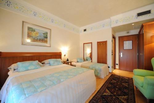 Habitación Triple del hotel Firenze. Foto 4