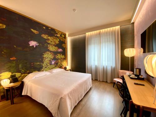 Habitación Triple Premium del hotel Firenze. Foto 1