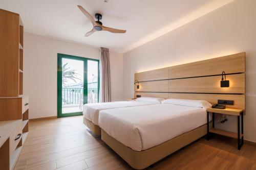 Junior suite Vista Piscina 2 Camas individuales del hotel Mynd Yaiza. Foto 1