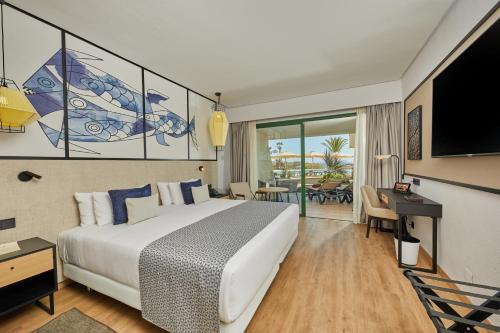 Preferred Club Double Room with Direct Pool Access del hotel Dreams Lanzarote Playa Dorada Resort and Spa. Foto 5