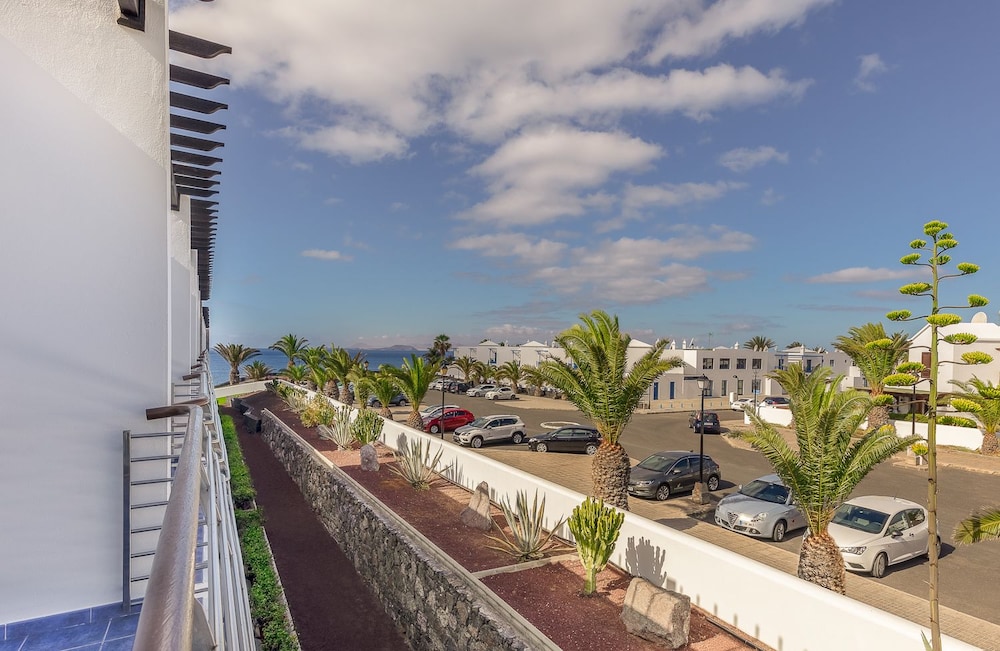 Habitación con 1 cama doble o 2 individuales, vistas parciales al mar (Lateral) del hotel Mirador Papagayo by LIVVO. Foto 5