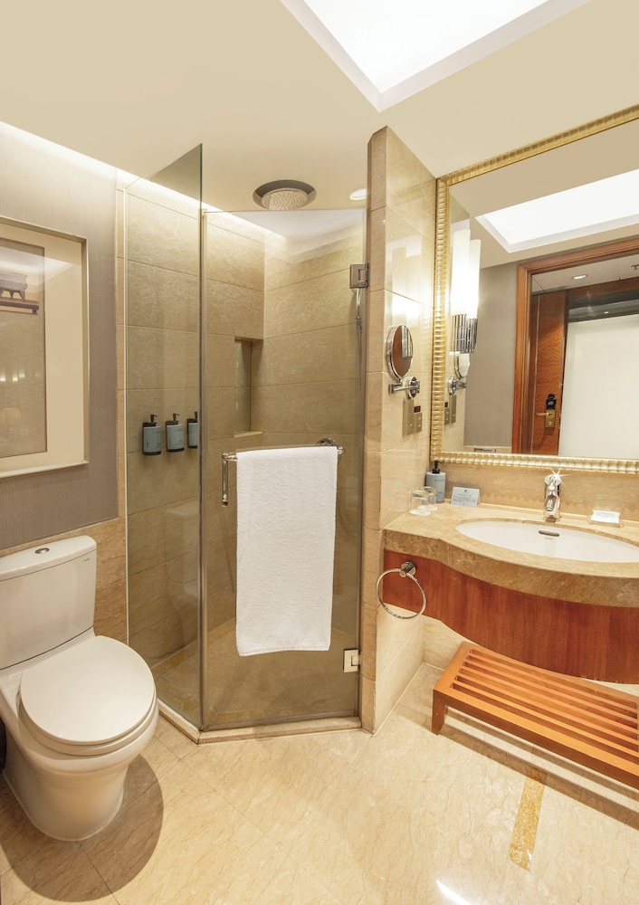 Habitación superior con 2 camas individuales del hotel Sofitel Harbin. Foto 7