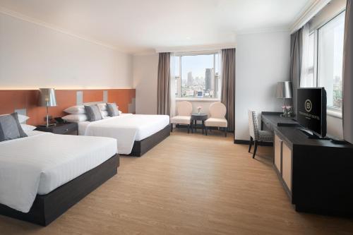 Habitación Familiar Premier (Torre Norte) del hotel The Berkeley Pratunam. Foto 1