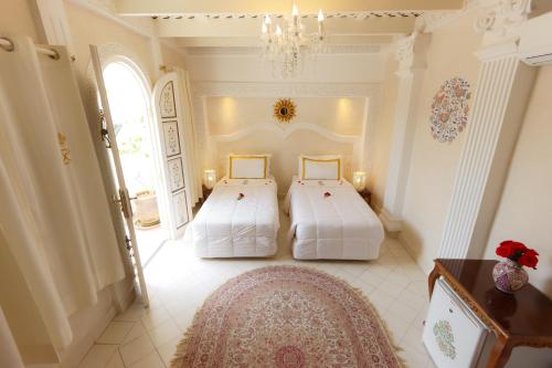 Habitación Doble Estándar - 2 camas del hotel Palais Des Princesses. Foto 1