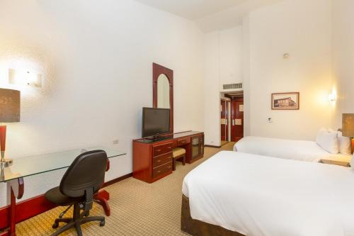 Habitación Doble Estándar con 2 camas grandes del hotel Radisson San Jose-costa Rica. Foto 4