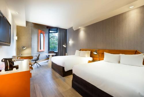 Habitación Doble Premium con 2 camas dobles del hotel Radisson San Jose-costa Rica