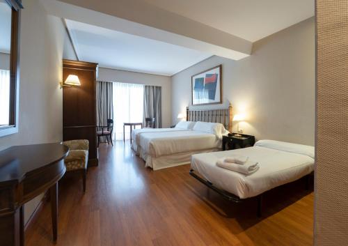 Habitación Doble con cama supletoria - 1 o 2 camas del hotel Barceló León Conde Luna