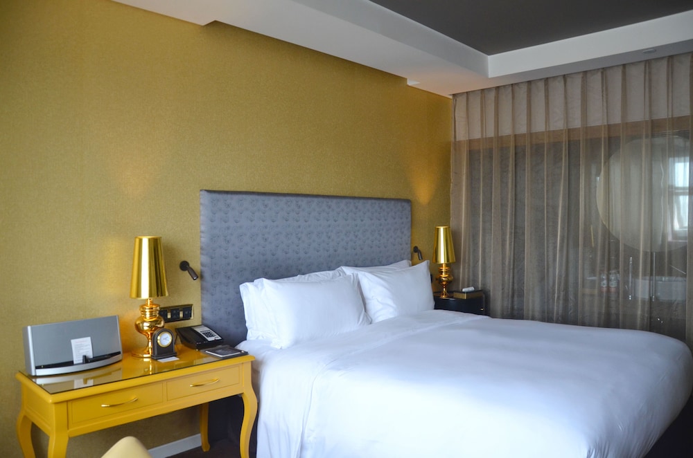 HABITACIÓN SUPERIOR, Acceso Club Millésime, 1 Cama King - Size del hotel Sofitel Zhengzhou International. Foto 2