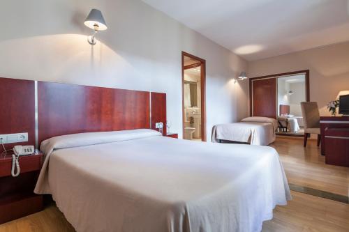 Habitación Doble con cama supletoria del hotel Crisol Riosol