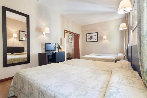 Habitación Doble con 2 camas supletorias del hotel Crisol Riosol