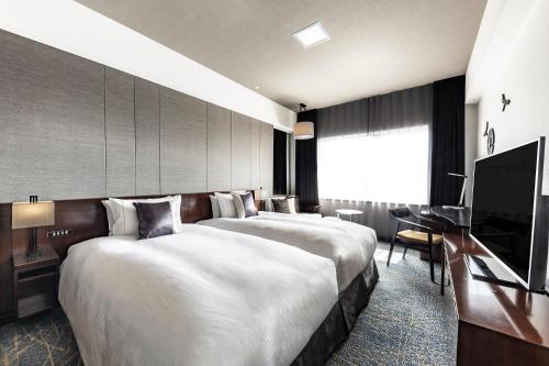 Habitación Doble Deluxe Premium - 2 camas del hotel The Royal Park Kyoto Sanjo. Foto 2
