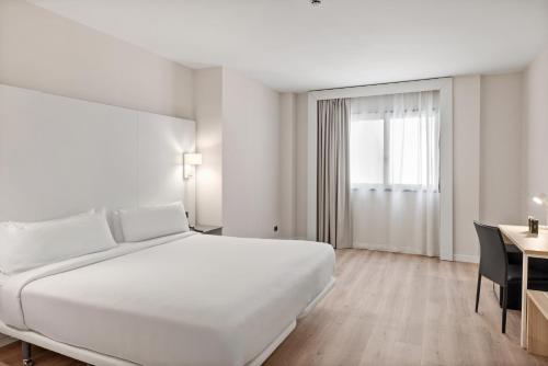 Habitación doble 1 Cama queen del hotel B&B Ciudad de Lleida. Foto 1