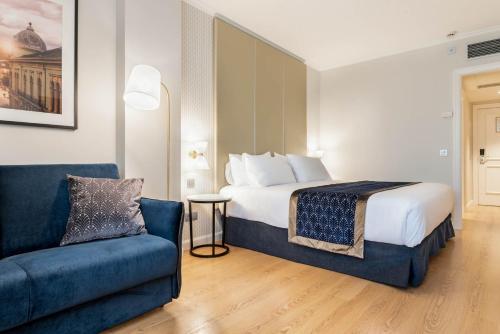 Habitación Doble con sofá cama del hotel Eurostars Gran Lugo. Foto 1
