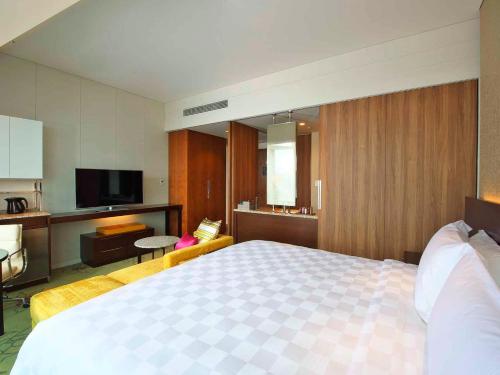Habitación Deluxe con cama extragrande - No fumadores del hotel Osaka Marriott Miyako