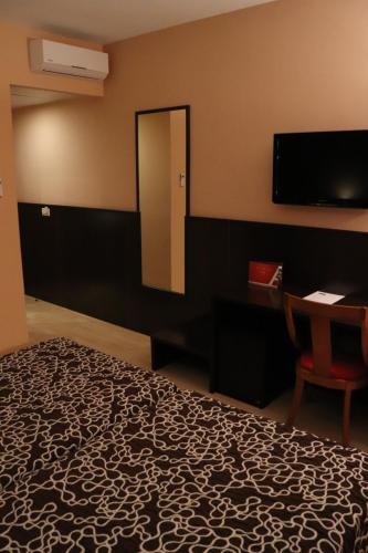 Habitación Doble - 1 o 2 camas del hotel Acosta Ciudad De La Musica. Foto 1