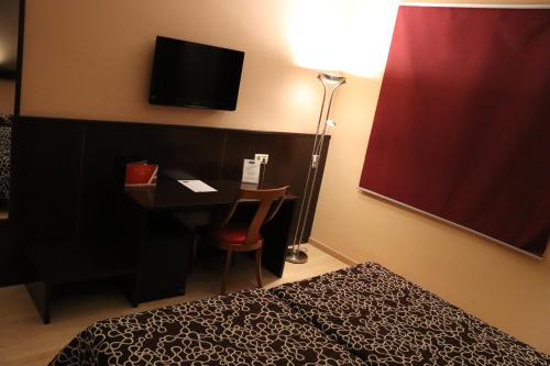 Habitación Doble - 1 o 2 camas del hotel Acosta Ciudad De La Musica. Foto 4