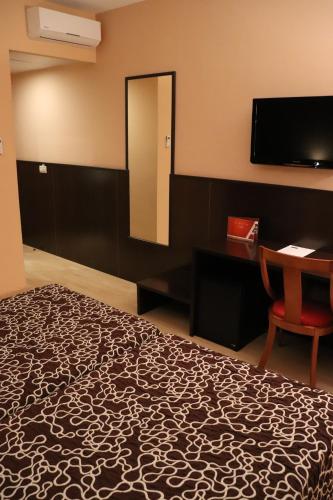 Habitación Doble - 1 o 2 camas del hotel Acosta Ciudad De La Musica. Foto 8