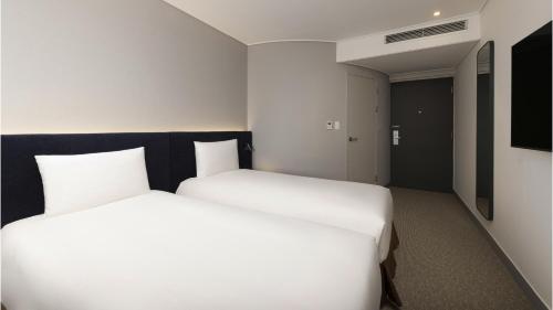 Habitación Doble Superior - 2 camas del hotel Ibis Ambassador Seoul Insadong. Foto 1