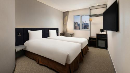 Habitación Doble Superior - 2 camas del hotel Ibis Ambassador Seoul Insadong. Foto 2
