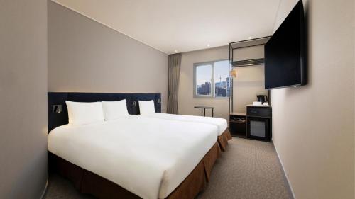 Habitación Doble Premium con cama individual del hotel Ibis Ambassador Seoul Insadong