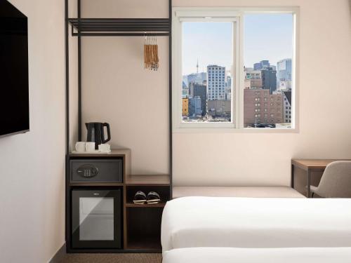 Habitación Doble Superior - 2 camas del hotel Ibis Ambassador Seoul Insadong. Foto 5