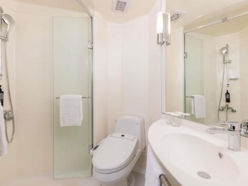 Superior Twin Room with Two Single Beds and Ikseon Hanok View del hotel Ibis Ambassador Seoul Insadong. Foto 5
