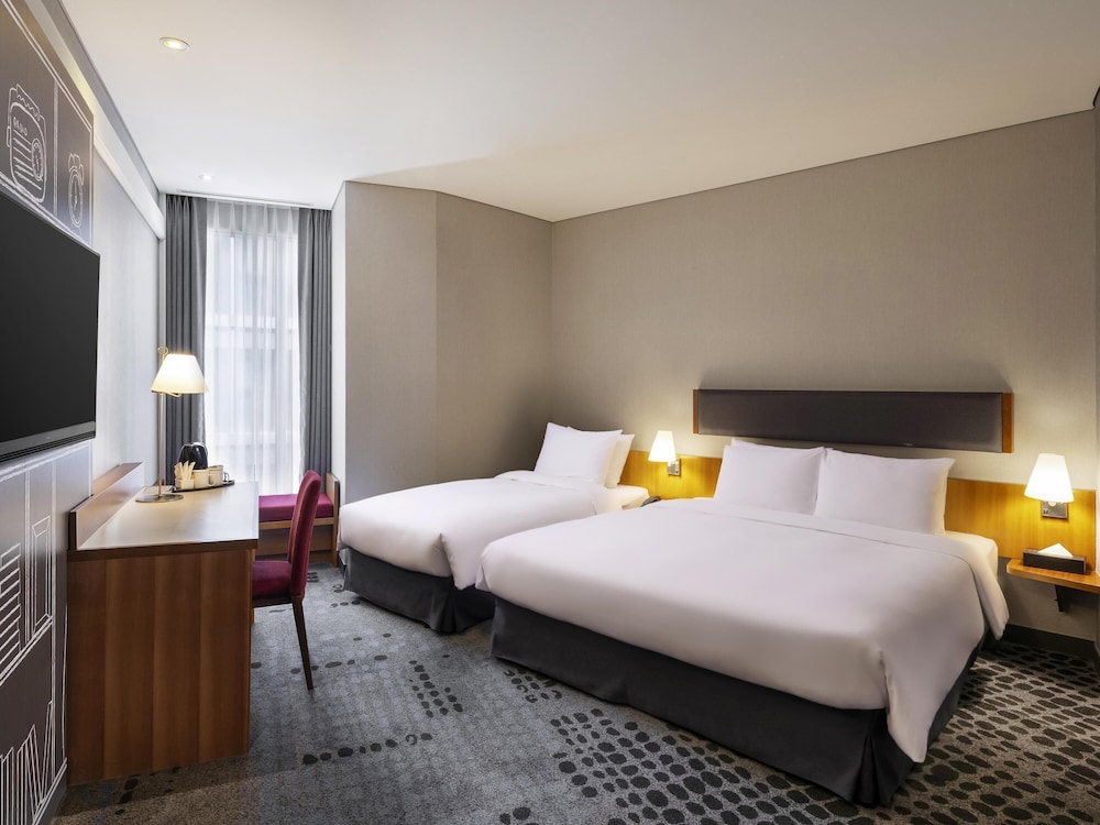 Suite junior, 1 cama doble del hotel Ibis Ambassador Seoul Myeongdong. Foto 2
