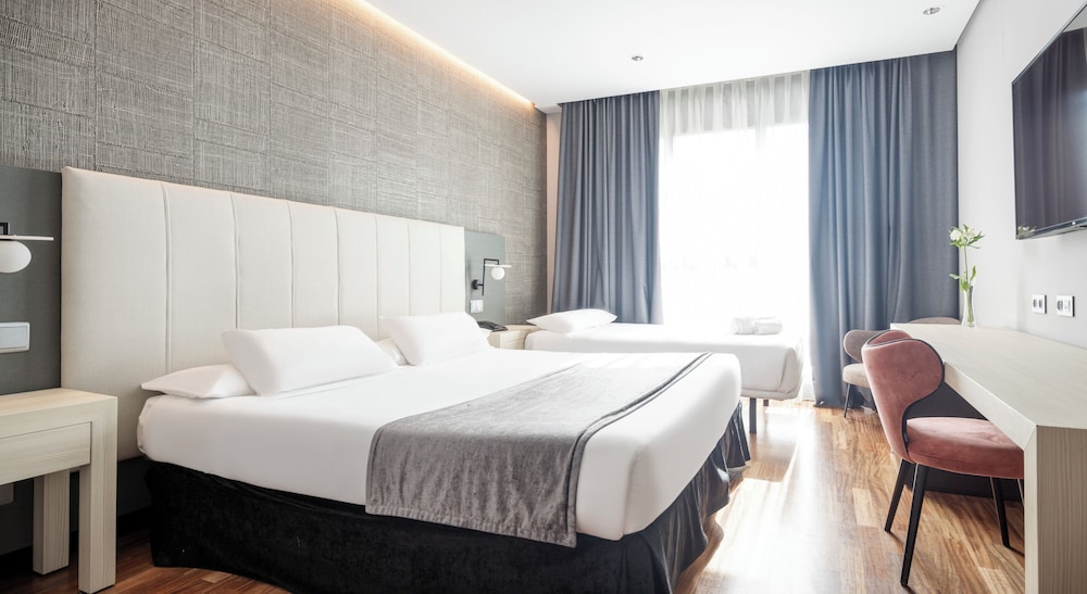 Habitación triple del hotel Ilunion Alcala Norte