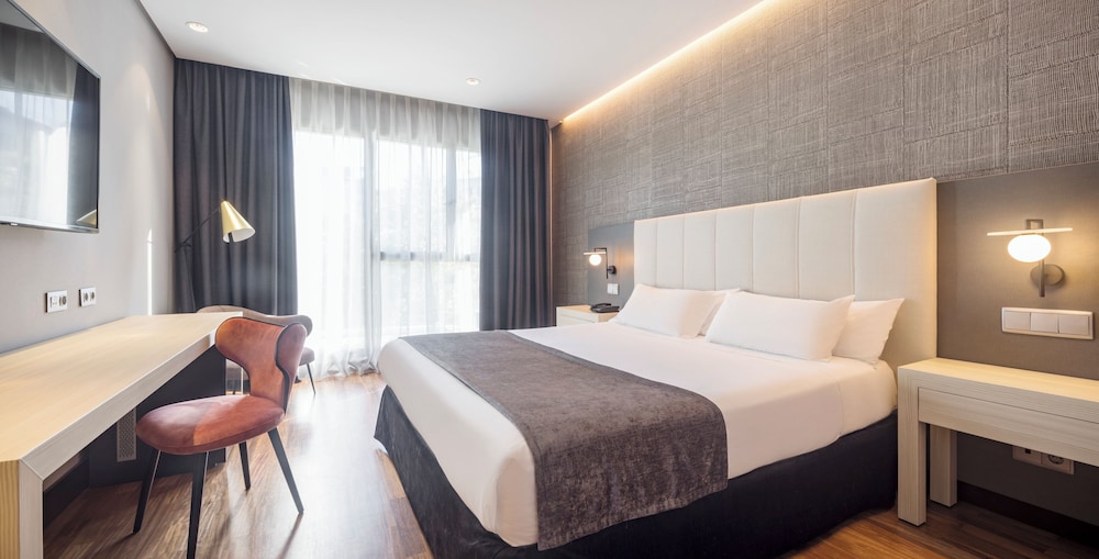 Habitación triple del hotel Ilunion Alcala Norte. Foto 2