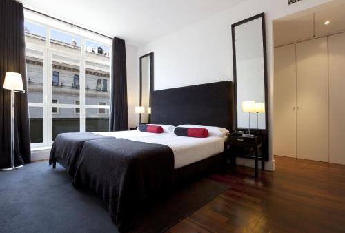 Habitación Triple del hotel Quatro Puerta del Sol. Foto 1