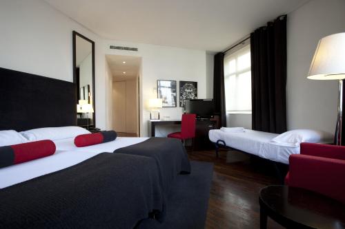 Habitación Triple del hotel Quatro Puerta del Sol. Foto 4