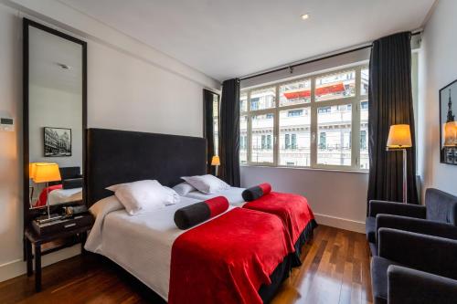Habitación Cuádruple con bañera del hotel Quatro Puerta del Sol