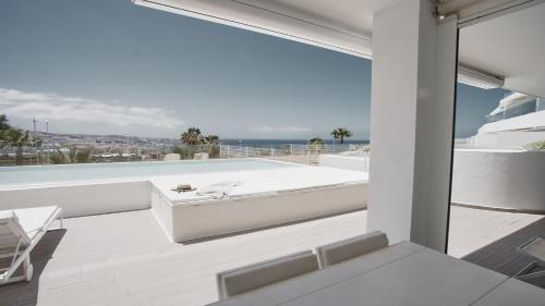 Suite Vista Mar Balcón o Terraza Con Cocina 1 habitación Futón japonés piscina 1 Cama doble del hotel Baobab Suites. Foto 1