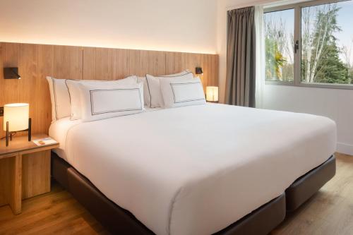 Habitación Meliá del hotel Melia Barajas. Foto 1