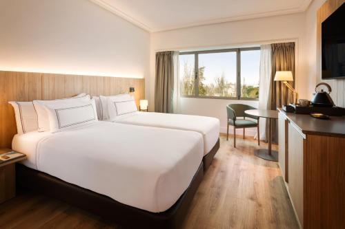 Habitación Meliá del hotel Melia Barajas. Foto 4
