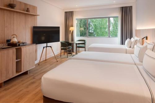 Habitación Triple del hotel Melia Barajas. Foto 5