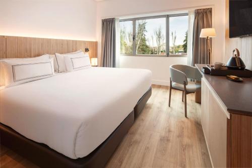 Habitación Meliá del hotel Melia Barajas. Foto 2