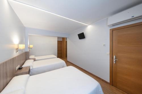 Habitación Cuádruple del hotel Panton. Foto 1